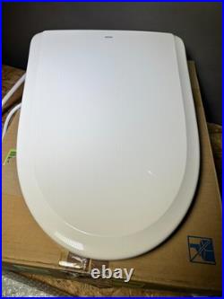 TOTO SW4734#12 WASHLET Electronic Bidet Toilet Seat, Elongated, beige READ TOTO SW4734#12 WASHLET Electronic Bidet Toilet Seat, Elongated, beige READ